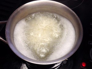 Boiling water with rice